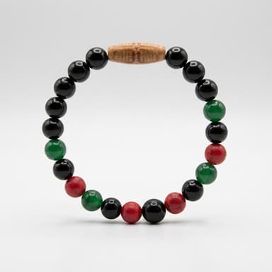 Pan-African Beaded Stretch Bracelet, Red Green Black Beads, Gold Lion Charm, Afrocentric Pride Gift, Sizes 6.5–10.5 in