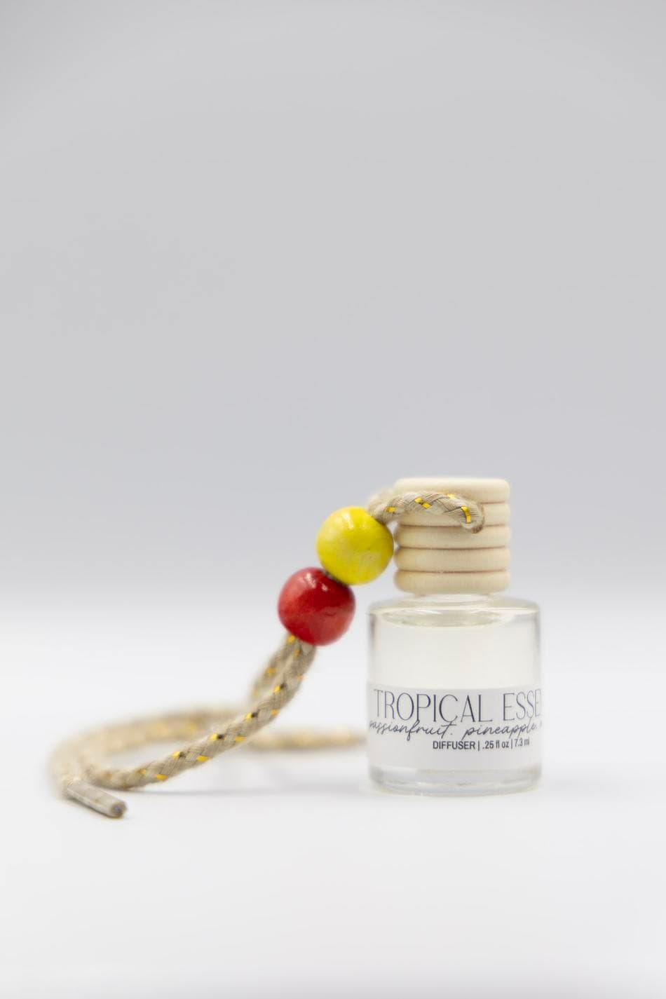 TROPICAL ESSENCE | .25 fl oz. Mini Diffuser | Passionfruit. Pineapple. Mango.
