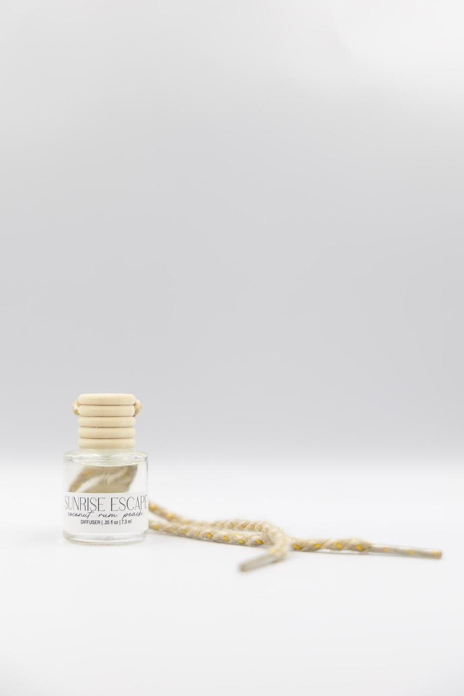 SUNRISE ESCAPE | .25 fl oz. Mini Diffuser | Coconut. Rum. Peach.
